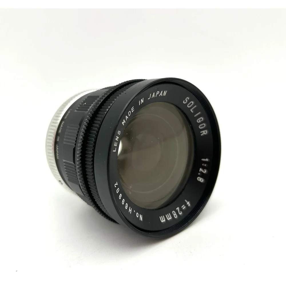 Soligor 28mm f2.8 Wide Angle Lens Japan H69902 with Braun Cap and Case